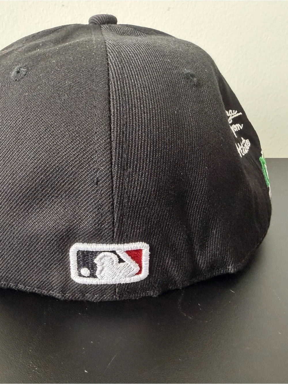 New Era Black Cap with White Script and Green Street Sign Patch